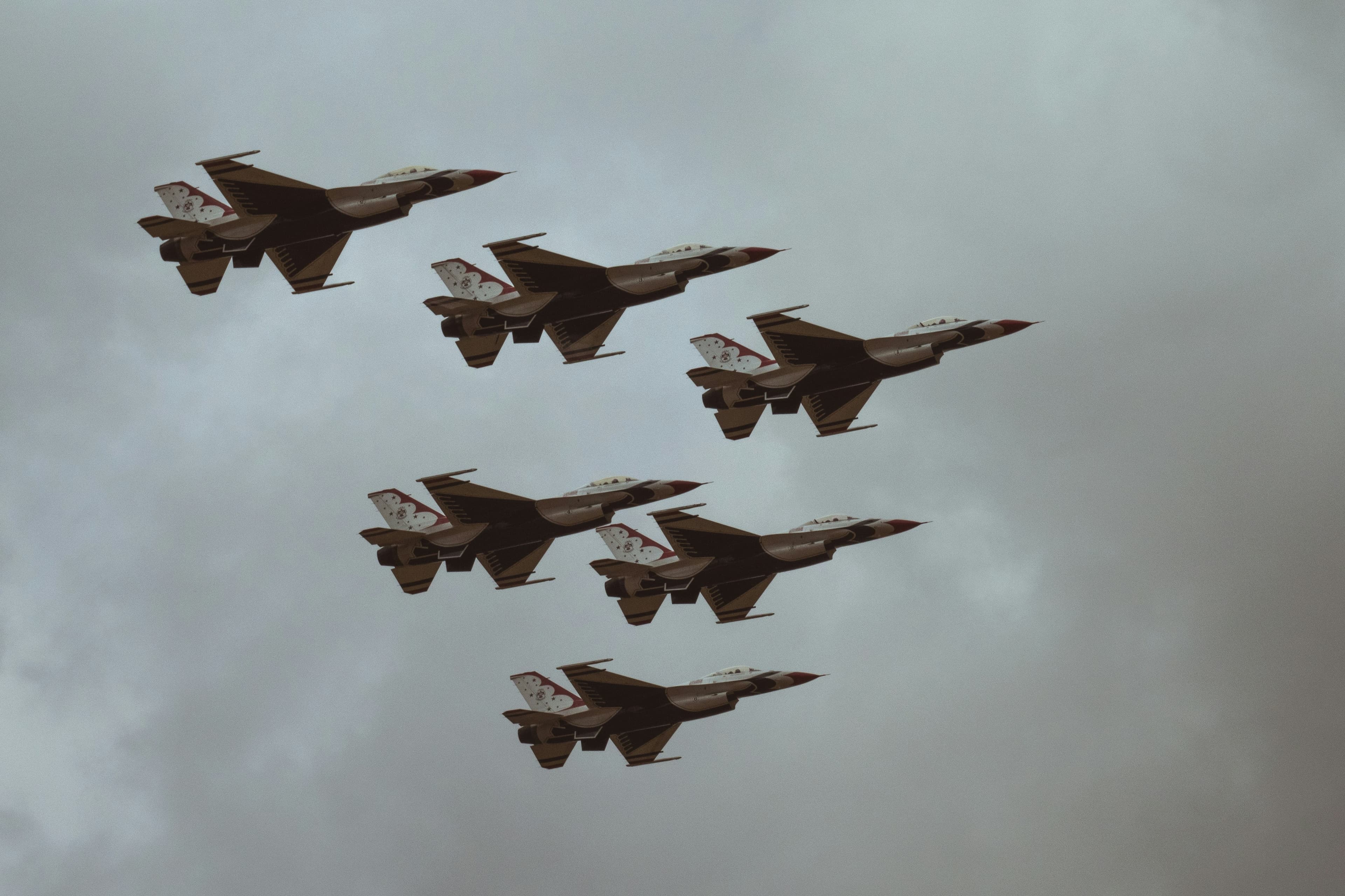US military aircraft on a desert airfield, reflecting the vulnerability of support planes in modern warfare.